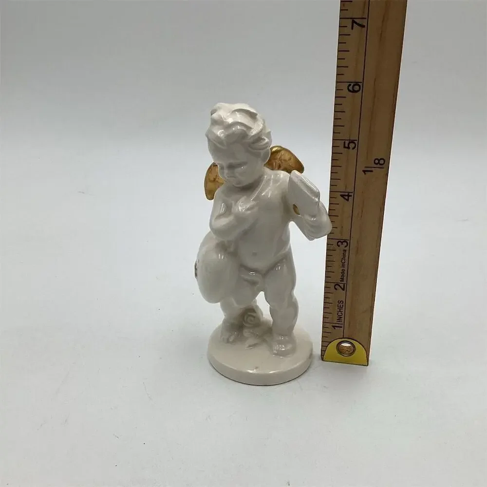 Vintage Angel Figurine with Gold Trim Wings 5.5” Multicolor‎